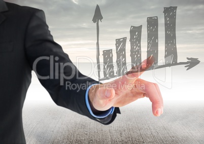 Business man mid section pointing at 3D graph against foggy background