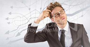 Frustrated business man against white wall and graph