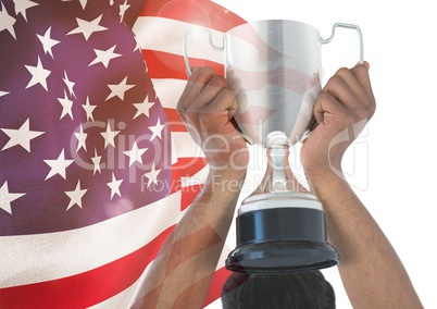 Part of a man holding a cup behind his head against fluttering american flag