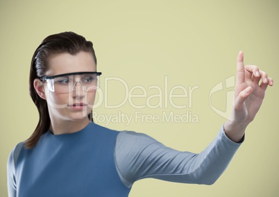 Woman in virtual reality headset against light green background