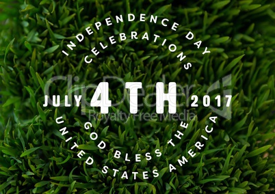 White fourth of July graphic against grass