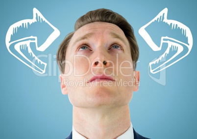 Man looking up at white 3D curved arrows against blue background