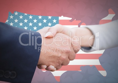 Business people shaking their hand against american flag