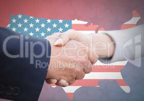 Business people shaking their hand against american flag