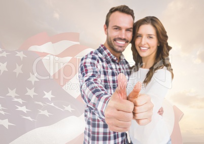 Couple thumbs up for independence day