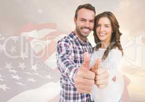 Couple thumbs up for independence day