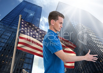 man shaking his hand against american flag and skyscapers