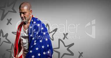 Man wrapped in american flag looking down against grey background with hand drawn star pattern