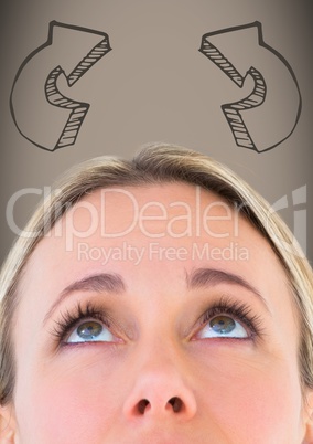 Top of woman's head looking up at brown 3D arrows against brown background