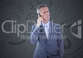 Frustrated business man against grey background and arrow graphics