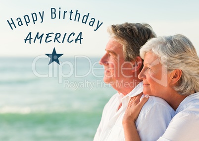 Blue fourth of July graphic against elderly couple looking out to sea
