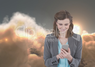 Smiling woman texting in 3D cloudy background