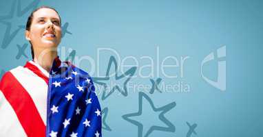 Woman wrapped in american flag against blue background with 3d hand drawn star pattern