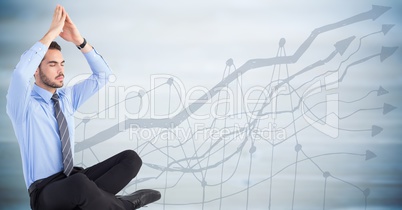 Business man meditating against 3d blurry blue wood panel with graph