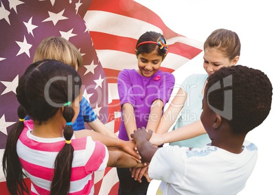 Happy children putting their hands together for independence day against 3d american flag