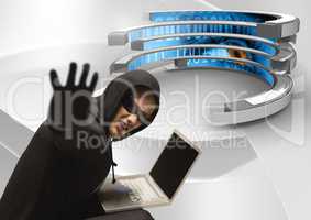 Hacker tendering his hand and using a laptop in a 3d data center