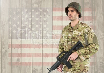 3d Proud soldier holding firearm against american flag