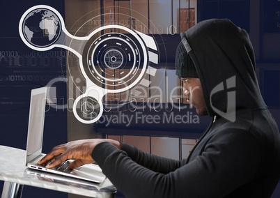 Side view of hacker using a laptop on a table in front of 3D digital background