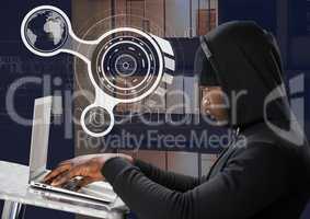 Side view of hacker using a laptop on a table in front of 3D digital background
