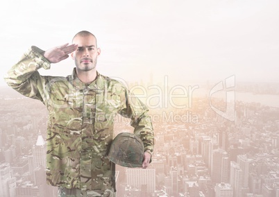 Soldier with hand in head in front of city buildings