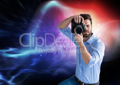Photographer taking pictures against colorful background