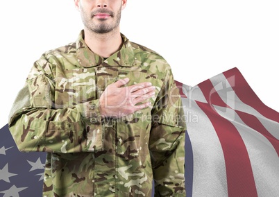 Soldier with hand of heart in front of the american flag