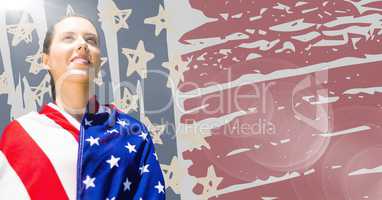 Woman wrapped in american flag against hand drawn american flag and flare