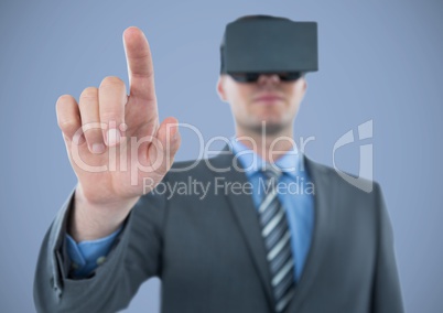 Man in virtual reality headset against purple background