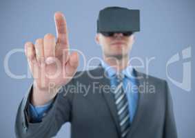 Man in virtual reality headset against purple background