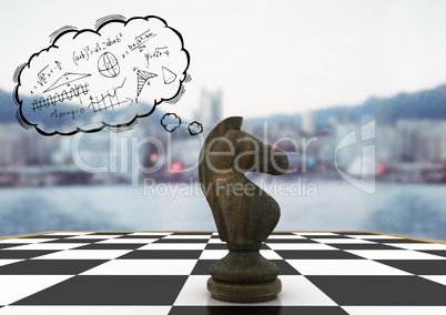 Chess piece and thought cloud with math doodles against blurry skyline