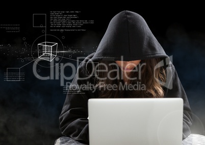 Woman hacker working on laptop in front of black digital background