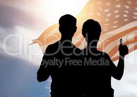 Couple silhouette against american flag