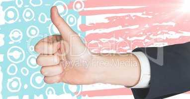 Hand giving thumbs up against hand drawn american flag