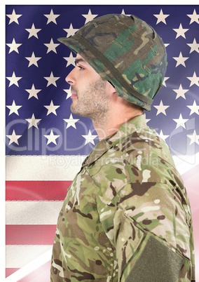 Side view of soldier in front of american flag