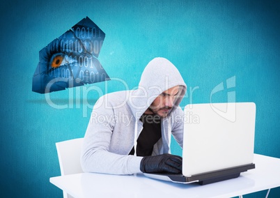 Hacker with glove using a laptop in front of blue background