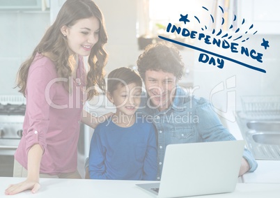 Smiling family watching a laptop for independence day