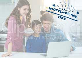 Smiling family watching a laptop for independence day