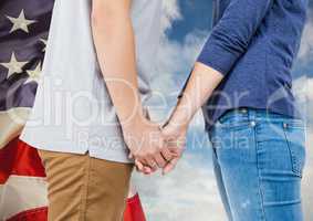 Part of a couple giving hands to each other against 3d american flag