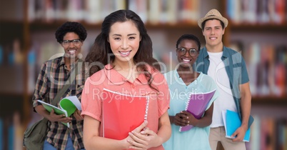 College students against blurry bookshelf