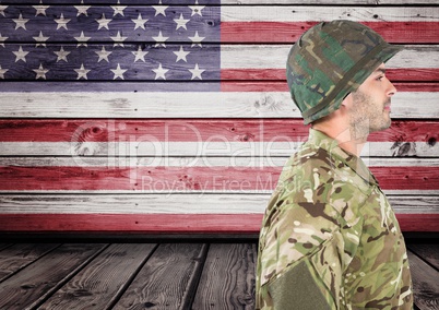 Military standing against american flag