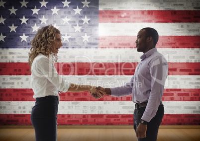 Business people shaking their hand against american flag