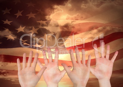 hands against american flag