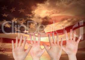 hands against american flag