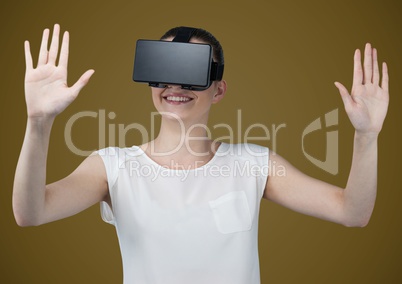 Woman in virtual reality headset against light brown background