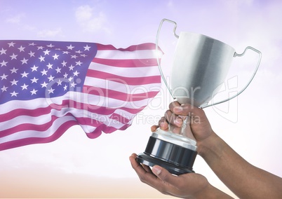 Hands holding a cup against american flag