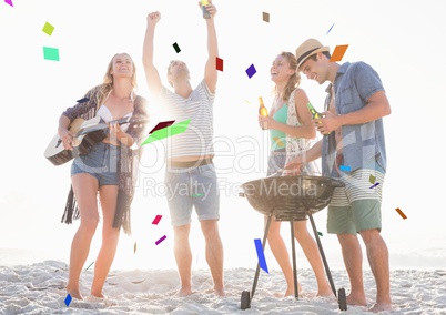 Confetti against millennials at beach party