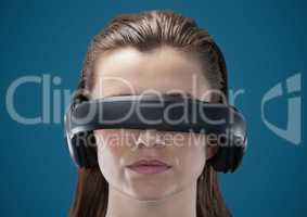 Woman in virtual reality headset against blue background