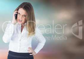 Angry business woman on phone against blurry blue brown background
