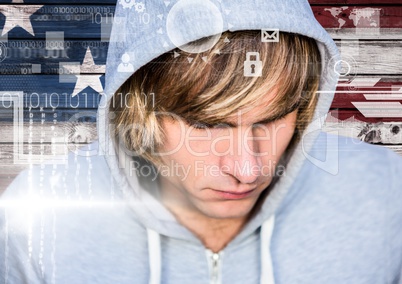 Close up of blond hair hacker in front of american flag on wood