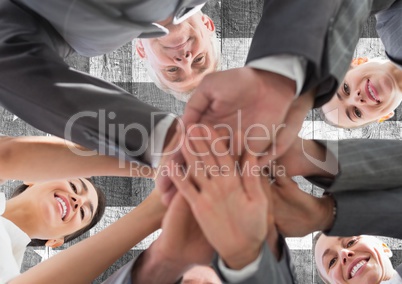 Business people with hands together